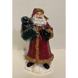 2002 Young’s Inc Resin Santa Holding Christmas Tree and Present 10" Tall